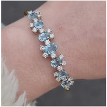 Load and play video in Gallery viewer, Vintage 18ct Gold Aquamarine &amp; Diamond Articulated Bangle
