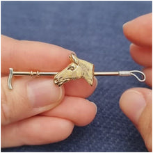 Load and play video in Gallery viewer, Antique 9ct Gold &amp; Silver Horse Riding Crop Brooch
