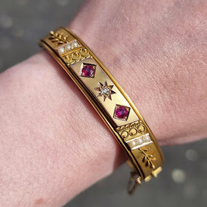 Edwardian 9ct Gold Ruby, Diamond & Seed Pearl Bangle modelled