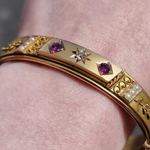 Load image into Gallery viewer, Edwardian 9ct Gold Ruby, Diamond &amp; Seed Pearl Bangle modelled
