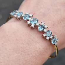 Load image into Gallery viewer, Vintage 18ct Gold Aquamarine &amp; Diamond Articulated Bangle modelled
