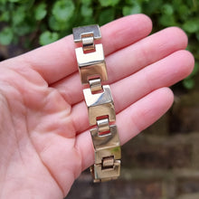 Load image into Gallery viewer, Vintage 9ct Gold Pyramid Link Bracelet in hand
