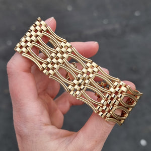 Vintage 9ct Gold Ornate Gate Bracelet with Heart Padlock in hand