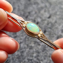 Load image into Gallery viewer, Antique 9ct Gold Opal &amp; Pearl Bar Brooch by Murrle Bennett in hand
