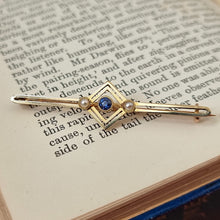 Load image into Gallery viewer, Antique 15ct Gold Sapphire &amp; Pearl Bar Brooch on book
