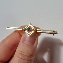 Load image into Gallery viewer, Antique 15ct Gold Sapphire &amp; Pearl Bar Brooch in hand
