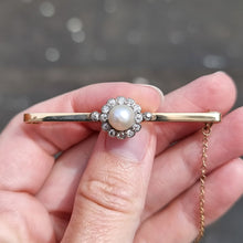 Load image into Gallery viewer, Edwardian 9ct Gold Pearl &amp; Diamond Bar Brooch in hand
