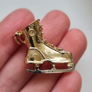 Vintage 9ct Gold Ice Skate Charm in hand