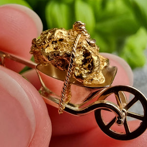 Antique Fine Gold Ore Wheelbarrow Charm in hand
