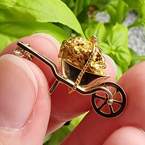 Antique Fine Gold Ore Wheelbarrow Charm in hand