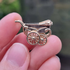 Vintage 9ct Gold Baby Pram Charm in hand