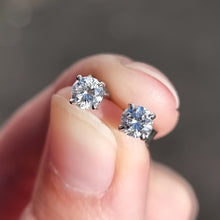 Load image into Gallery viewer, 18ct White Gold Brilliant Cut Diamond Stud Earrings, 0.53ct in hand
