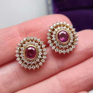 18ct Gold Ruby and Diamond Cluster Stud Earrings in hand