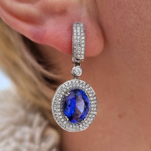 18ct White Gold Tanzanite and Diamond Cluster Drop Earrings modelled