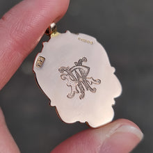Load image into Gallery viewer, Art Deco 9ct Gold Welsh Dragon Enamel Fob Medal in hand
