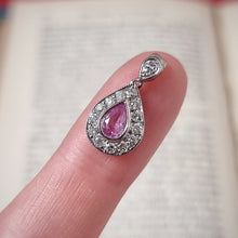 Load image into Gallery viewer, Vintage 18ct White Gold Pink Sapphire &amp; Diamond Pendant in hand

