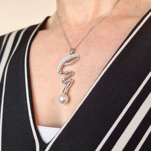18ct White Gold Pearl and Diamond Twist Pendant with Chain modelled