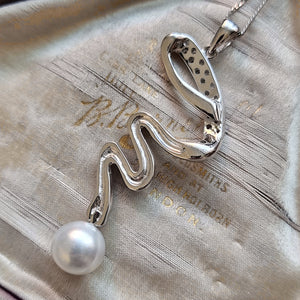 18ct White Gold Pearl and Diamond Twist Pendant with Chain back