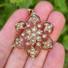 Load image into Gallery viewer, Antique 9ct Gold Seed Pearl Flower Pendant in hand

