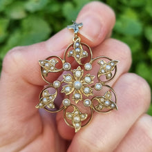 Load image into Gallery viewer, Antique 9ct Gold Seed Pearl Flower Pendant in hand
