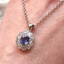 Load image into Gallery viewer, 18ct White Gold Tanzanite and Diamond 0.80ct Pendant with 9ct Chain in hand
