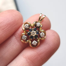 Load image into Gallery viewer, Vintage 18ct Gold Sapphire and Diamond Flower Pendant in hand
