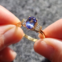 Load image into Gallery viewer, Vintage 18ct Gold Tanzanite &amp; Diamond Seven Stone Ring in hand
