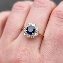 Load image into Gallery viewer, Vintage 18ct Gold Sapphire &amp; Diamond Cluster Ring modelled on finger
