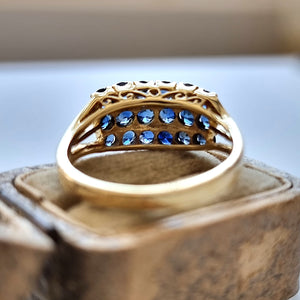 Vintage 14ct Gold Three Row Sapphire Ring behind head