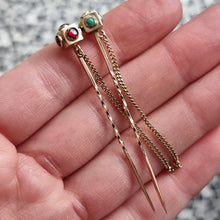 Load image into Gallery viewer, Antique Pair of 9ct Gold Turquoise &amp; Garnet Stick Pins in hand
