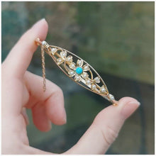 Load and play video in Gallery viewer, Antique 15ct Gold Turquoise &amp; Pearl Flower Bangle
