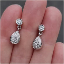 Load and play video in Gallery viewer, 18ct White Gold Diamond Pear Drop Stud Earrings, 0.55ct
